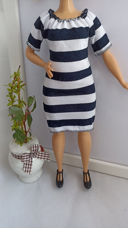 Curvy doll in white and black stripes dress, stretch.